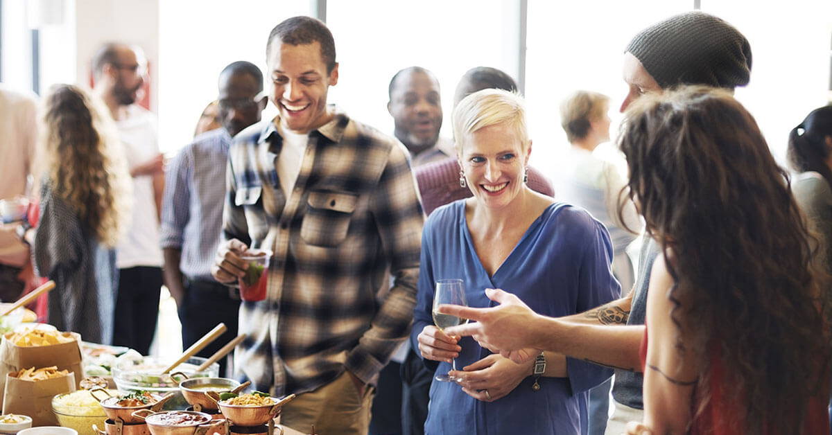 Nonprofit Professionals Talking at a Fundraising Event